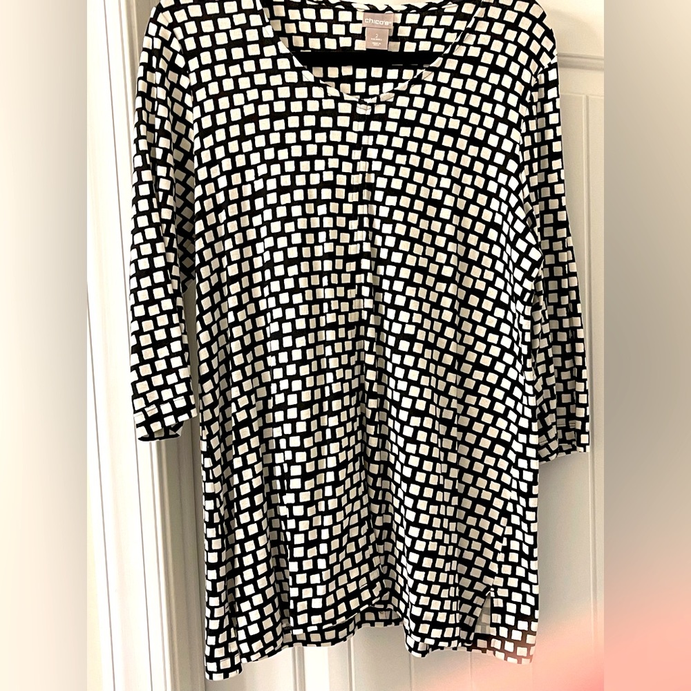 Tunic. Long black/white for day or dressing down.